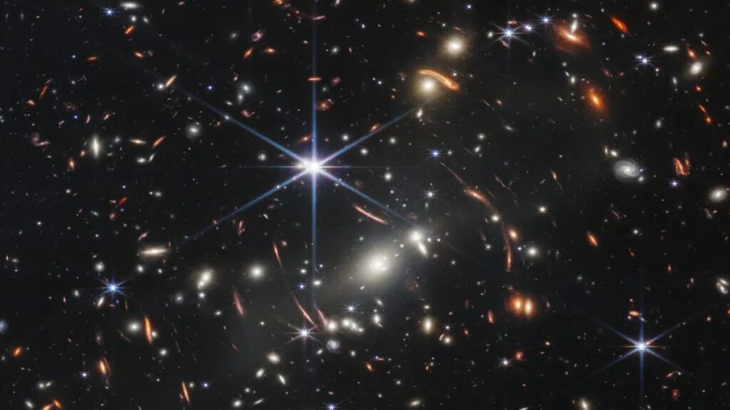 A close-up of an astronomer's workspace with a telescope